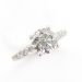 4 Prong Solitaire Setting With French Pavé Diamonds 3/4 Way Along The Band